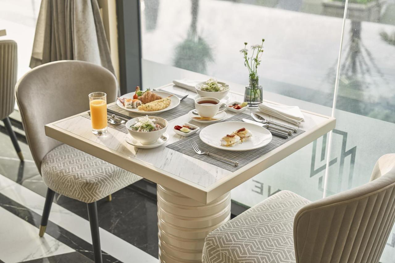 Hotel La Siesta Premium Saigon Ho Chi Minh Zewnętrze zdjęcie A table set for breakfast